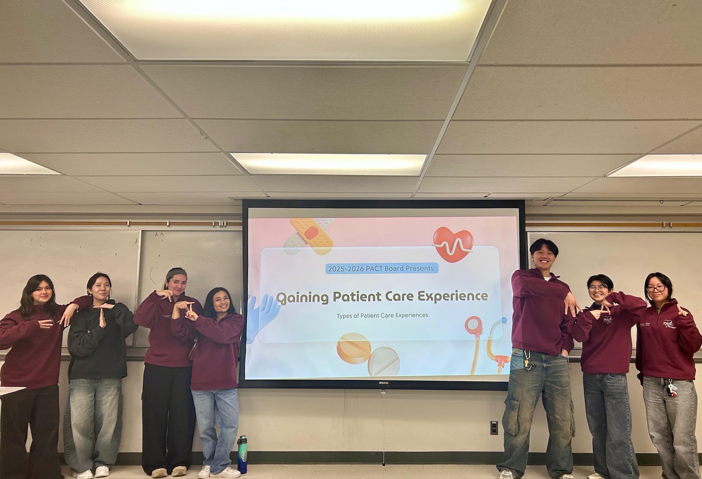 PACT board presenting a general meeting slideshow